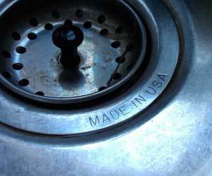 How do I get rid of the smell in my kitchen sink?